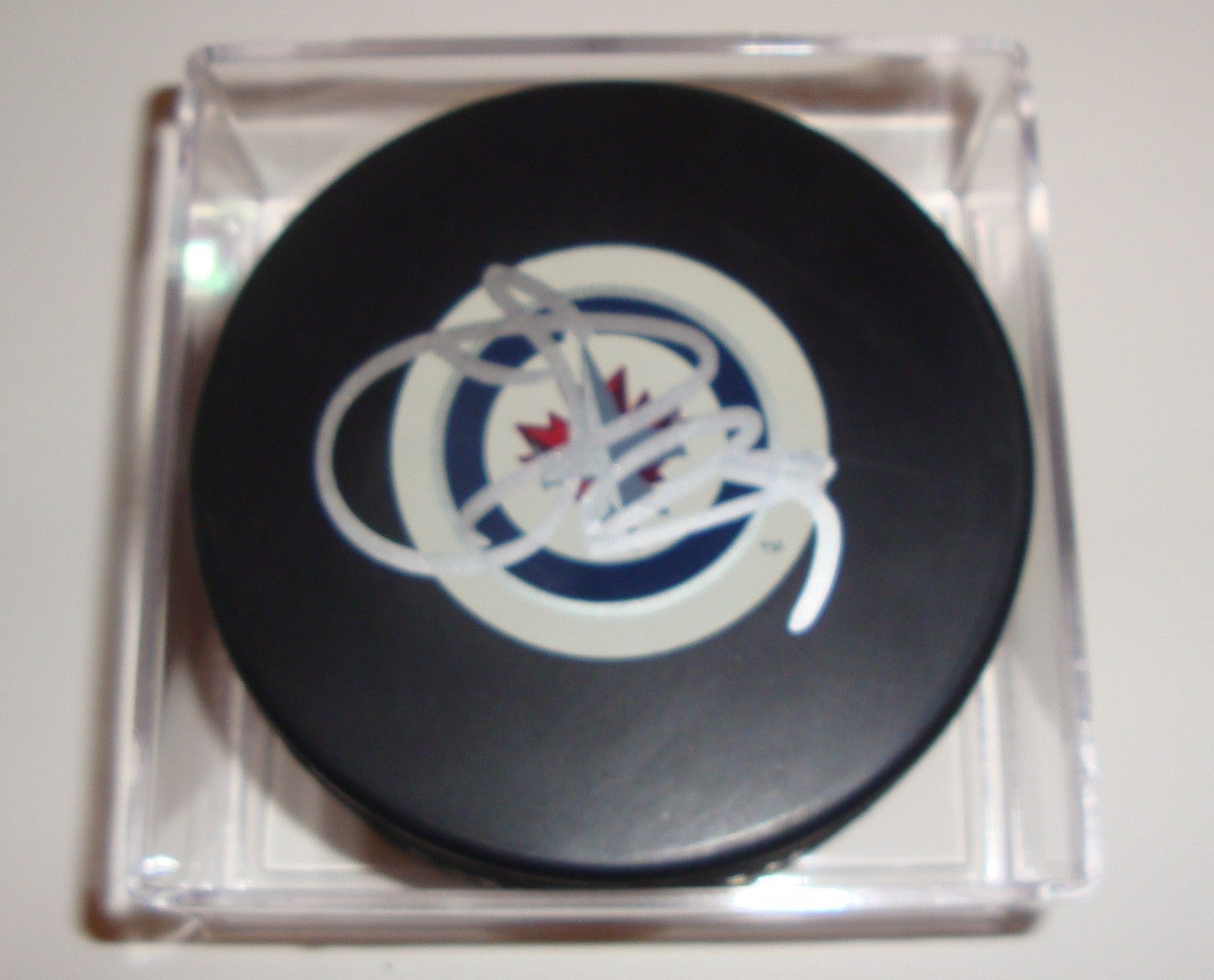 Johnny Oduya Signed Puck w/COA Winnipeg Jets Inaugural Autograph Souvenir 2011 A