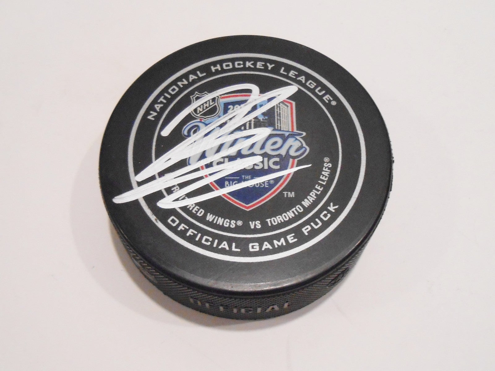 Luke Schenn Signed Winter Classic Puck w/COA 2014 Toronto Maple Leafs